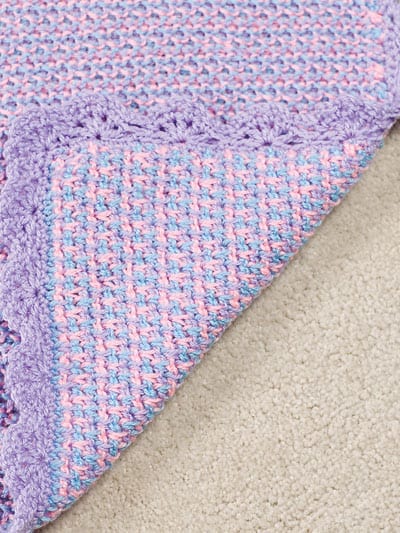 A close up of a baby blanket