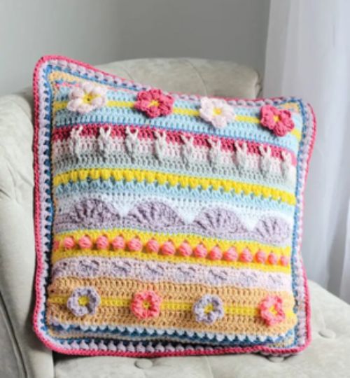 The Stitch Sampler Spring Rhapsody Pillow by Nana’s Crafty Home