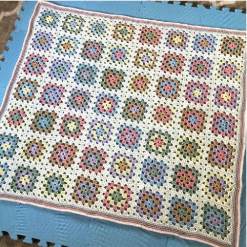 The Farmhouse Granny Square Baby Blanket by Madame Stitch