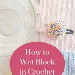 pin cushion and crochet square and bowl of water
